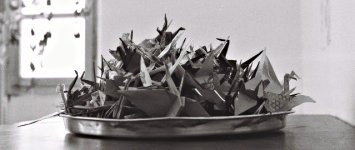 <p>Paper cranes in a bowl</p>